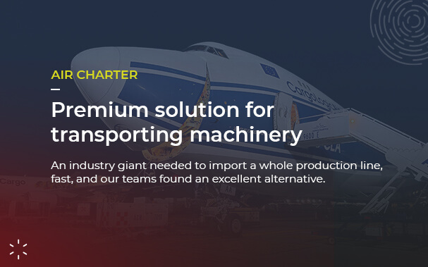 Over the picture of the air charter with its nose opened, it's written: AIR CHARTER Premium solution for transporting machinery An industry giant needed to import a whole production line, fast, and our teams found an excellent alternative.